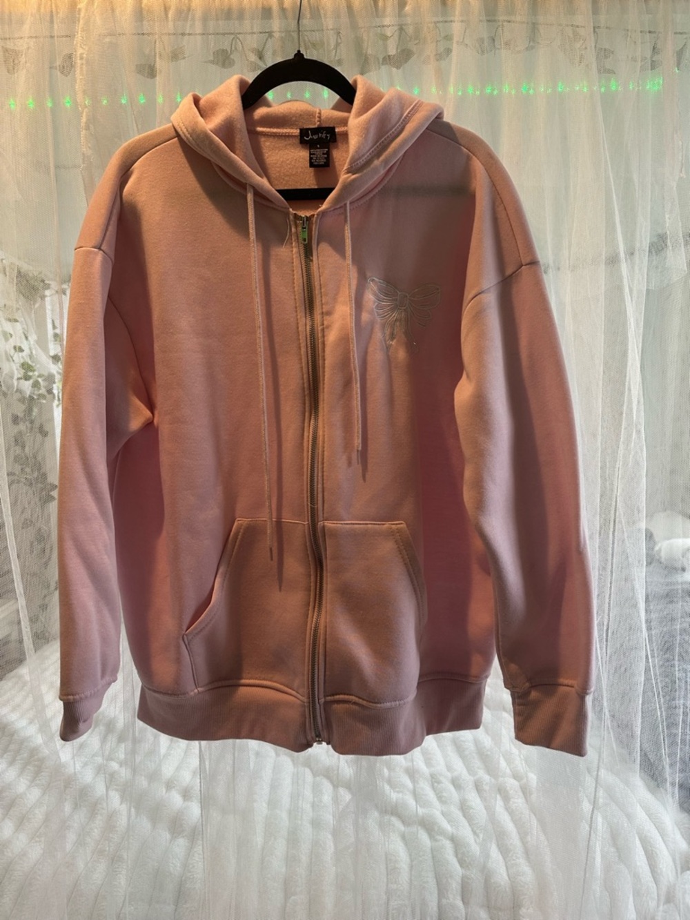 Women’s pink and white size large zip up hoodie